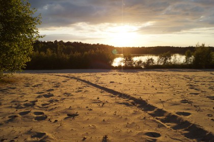 sunset over sand at cyrtsal waters lake, bawsey, king's lynn